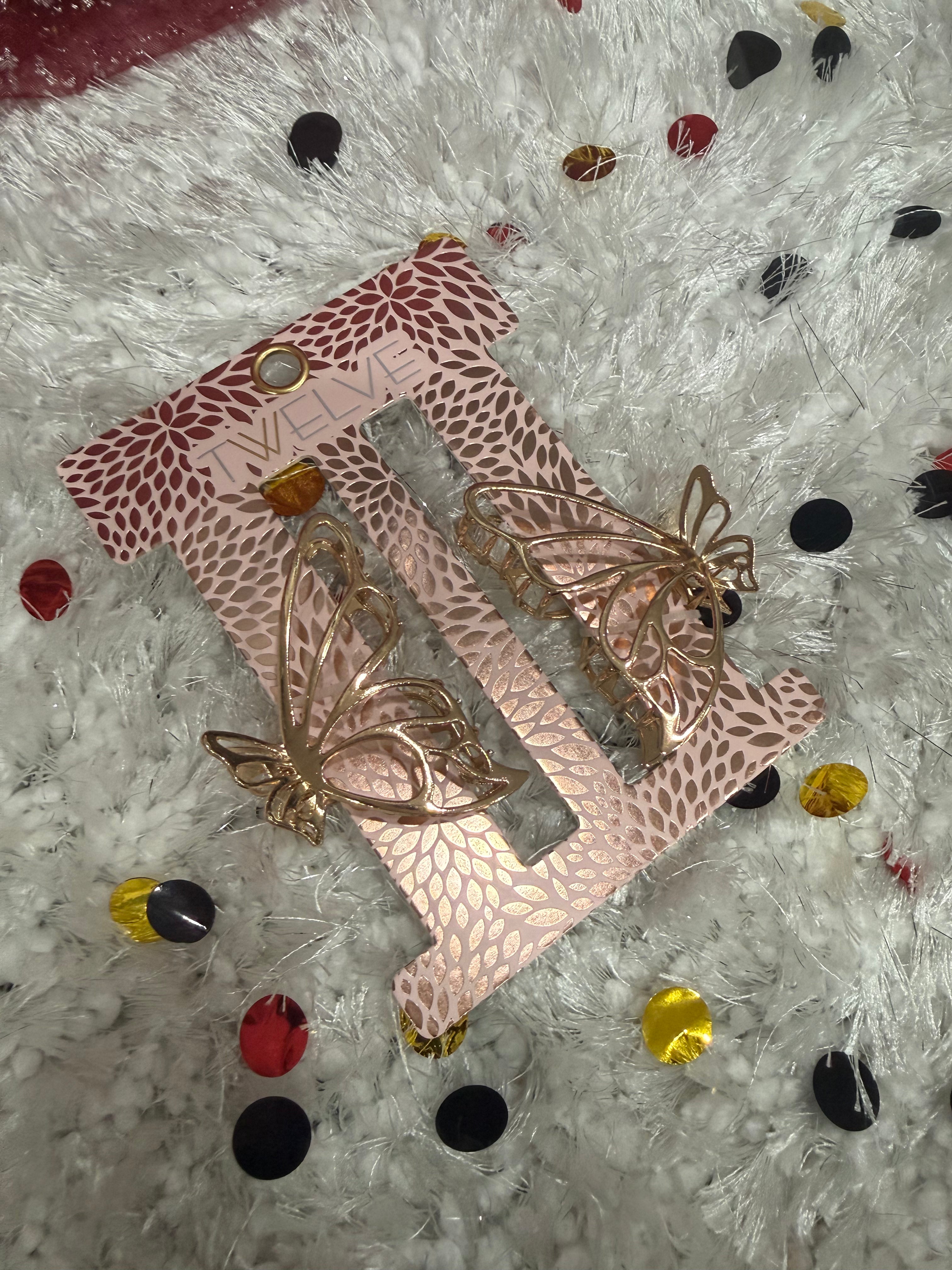 Metal butterfly hair claw clips set with decorative embellishments