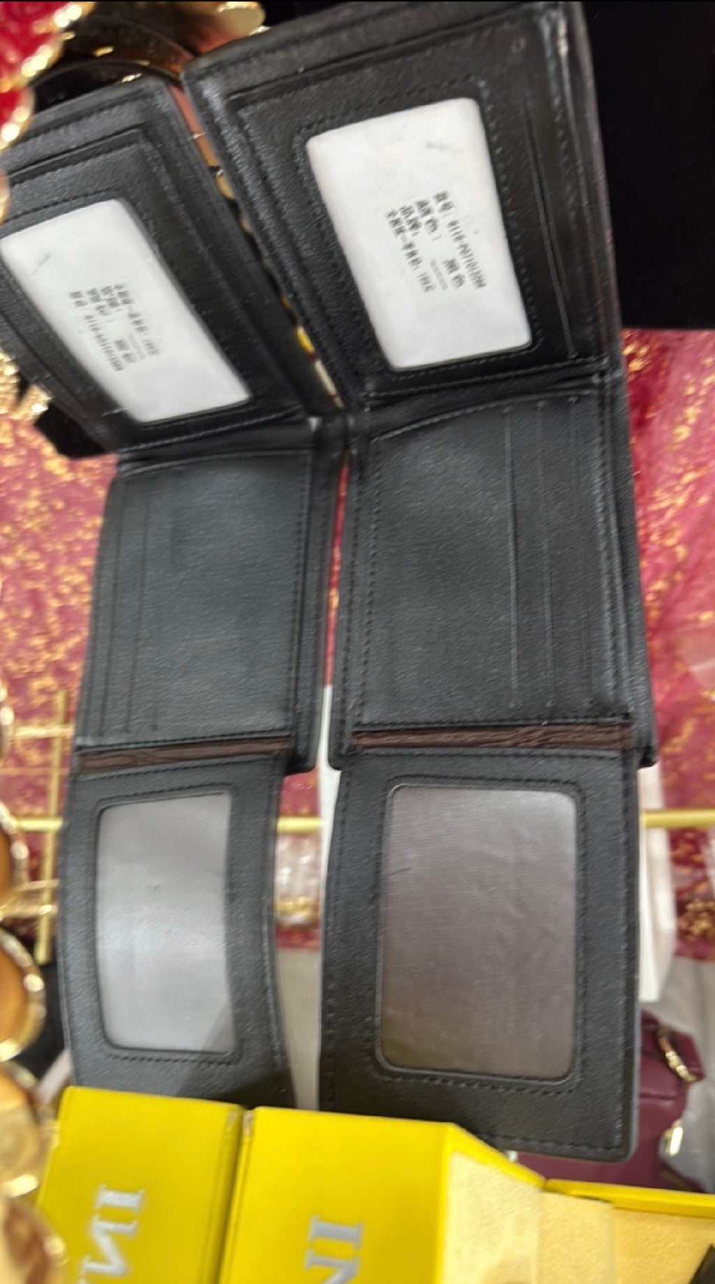 Leather bifold wallet, black with embossed eagle design