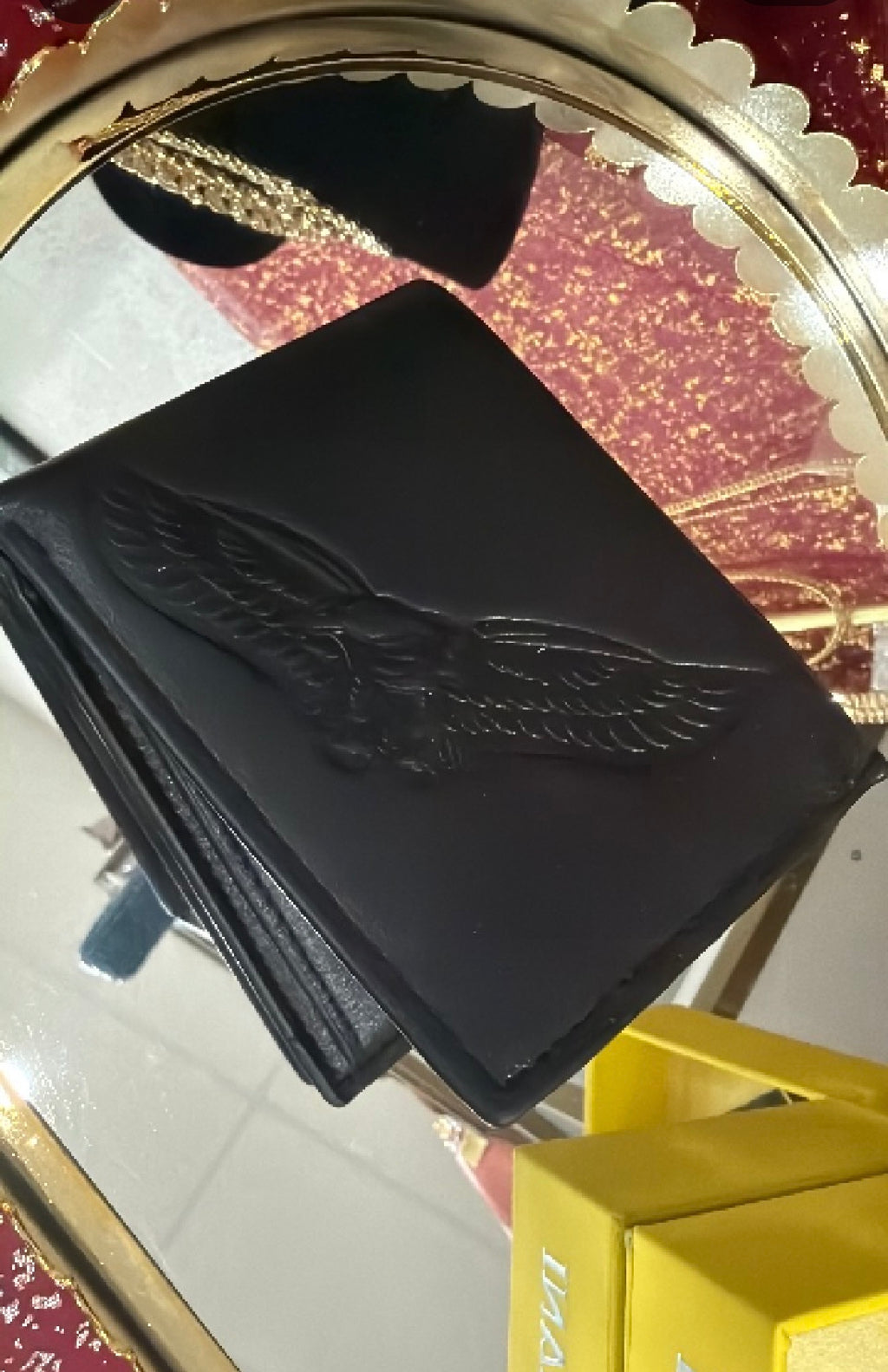 Leather bifold wallet, black with embossed eagle design